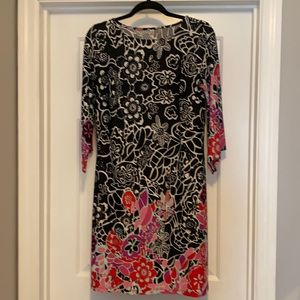 Long sleeve dress in multiple colors but mainly black